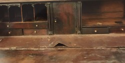 Before: badly damaged interior of a Georgian mahogany bureau bookcase, removed from a Hereford solicitor’s office