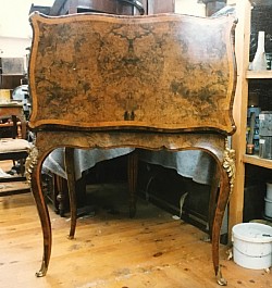 The sun damaged table after some careful staining and repolishing.